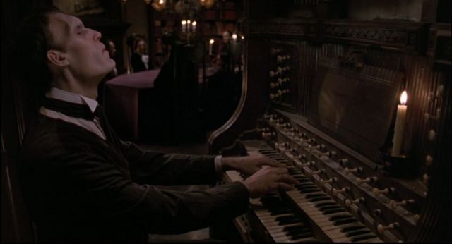 Lurch playing the harpsichord